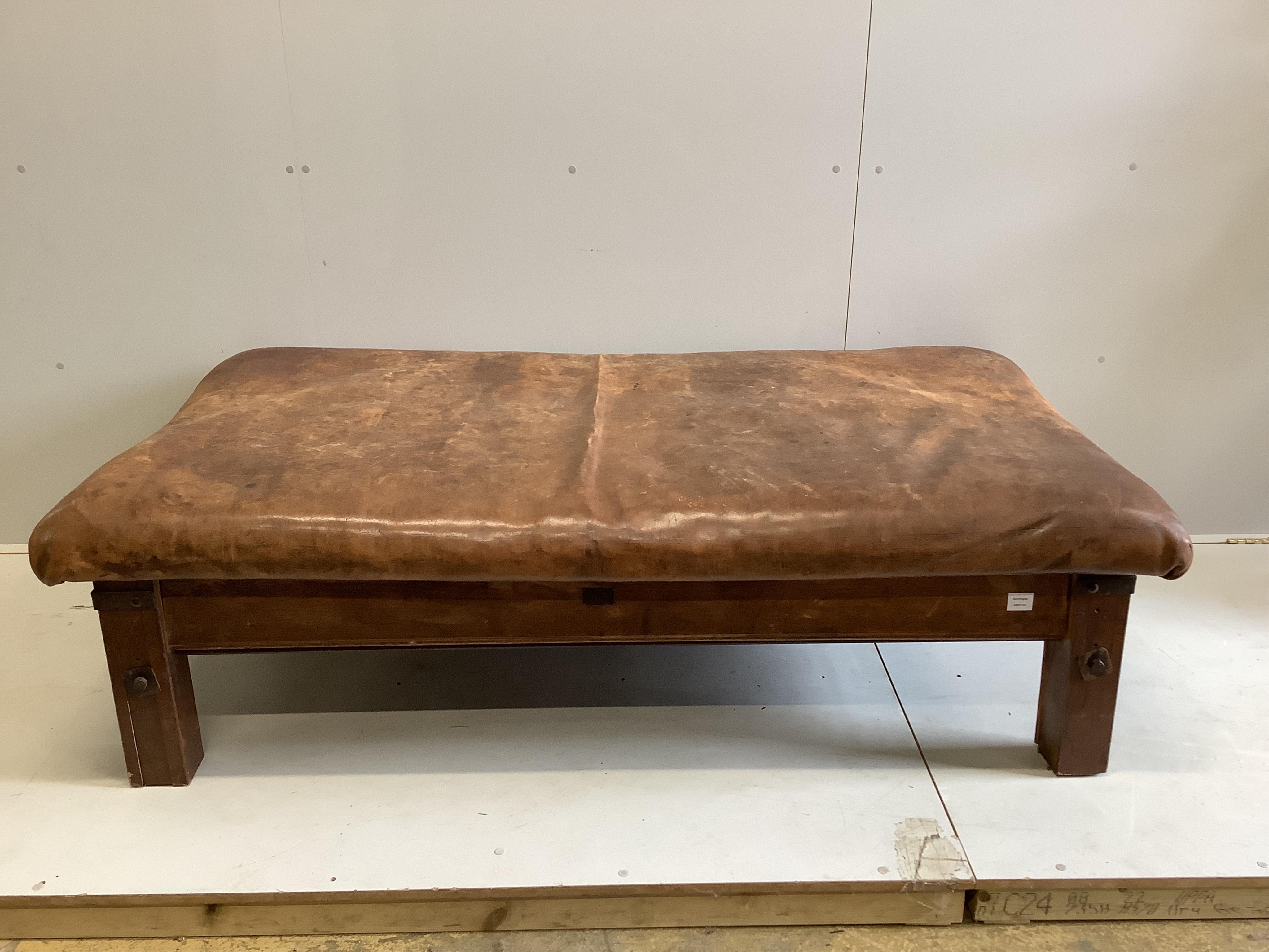 A Contemporary rectangular brown leather stool, width 178cm, depth 90cm, height 50cm. Condition - fair